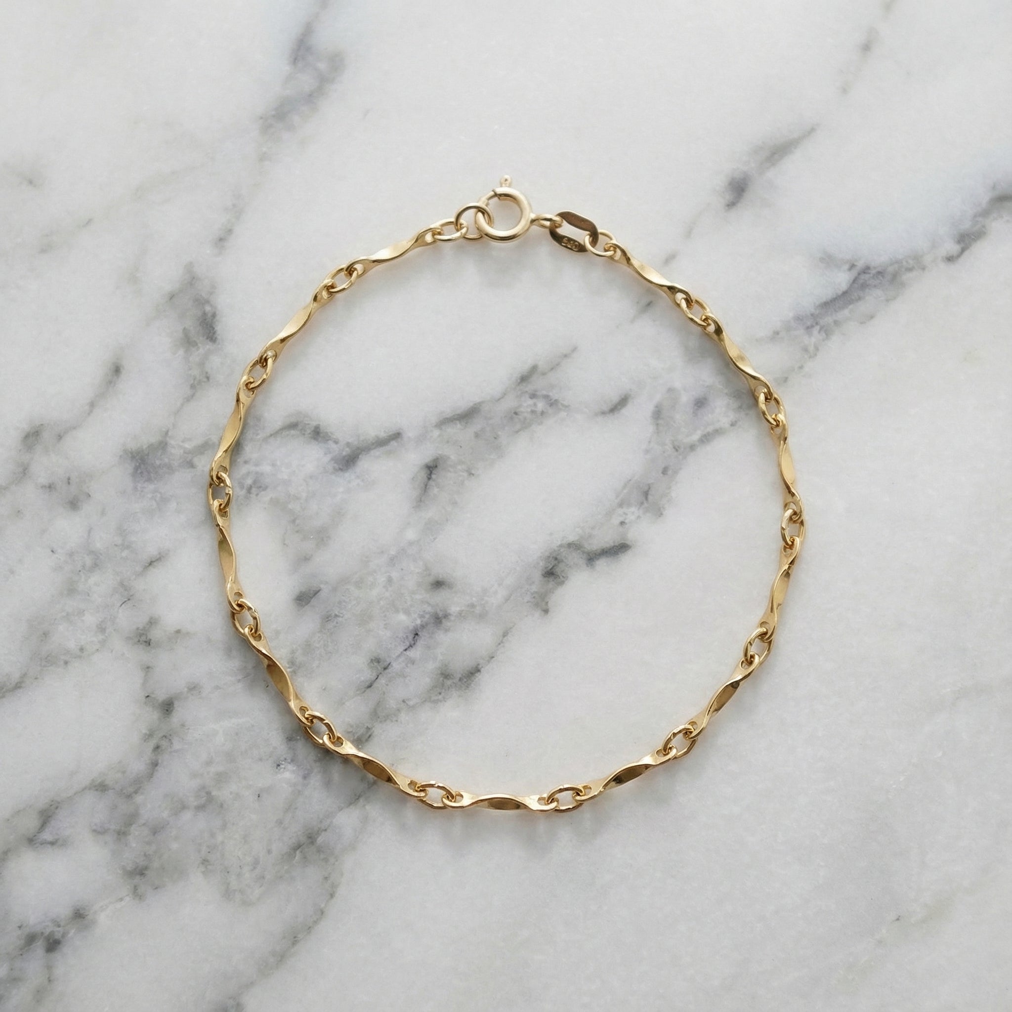 14k gold wave pattern bracelet